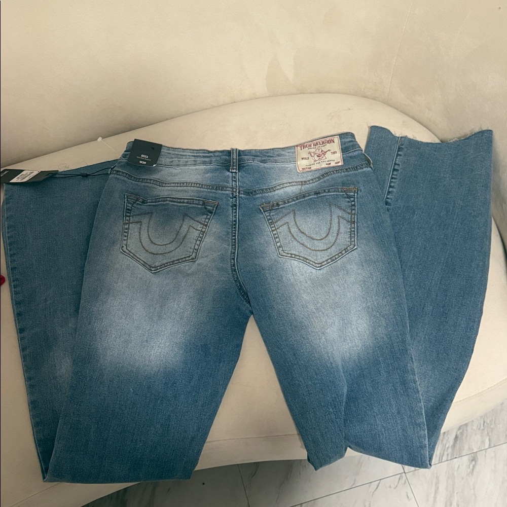 True Religion Medium Blue Distressed Back Pocket Jeans